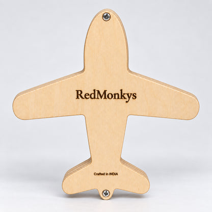 Back view of RedMonkys Sky Explorer wooden airplane busy board with engraved branding and Crafted in India marking