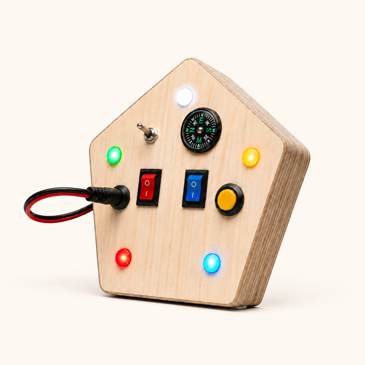 Angled view of RedMonkys Pentagon Explorer wooden busy board showing layered birch wood construction