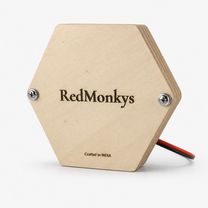 Back view of RedMonkys Honeycomb Explorer wooden busy board showing premium birch wood finish and RedMonkys branding