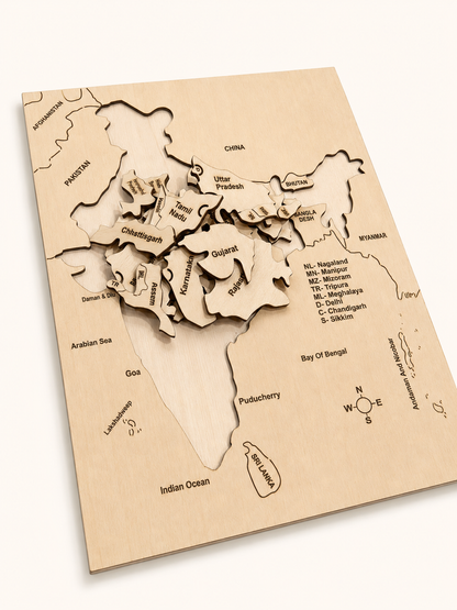 Angled view of RedMonkys Map of India Puzzle showing birch board tray and engraved wooden pieces